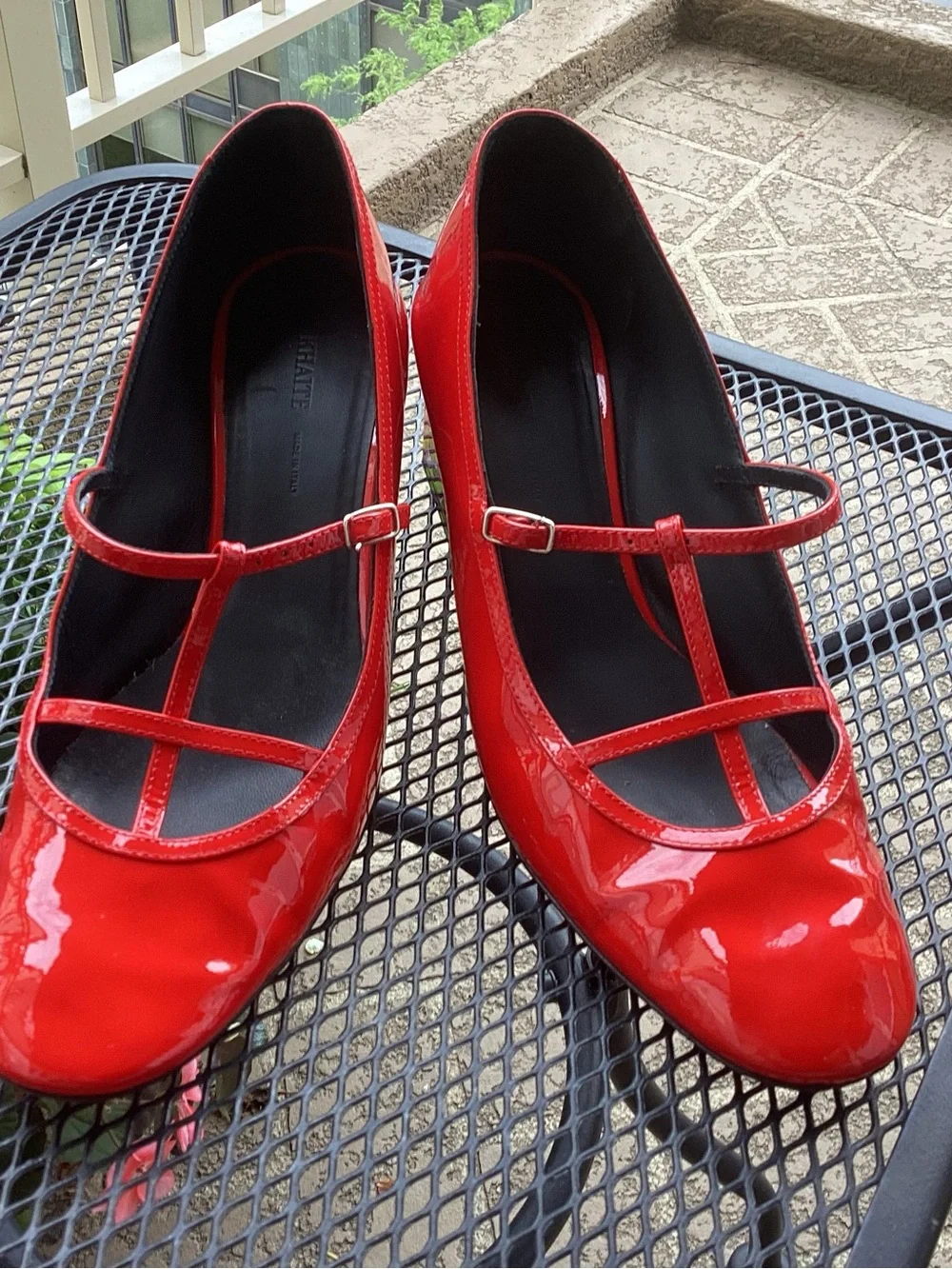 KHAITE Red Patent Mary Jane Heels with T-Strap